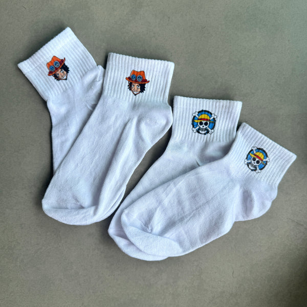 2 pares de medias calavera y ace